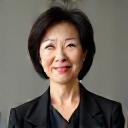 Portrett av Chen Wei, en fornøyd internasjonal investor.